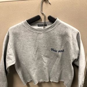 Brandy Melville gray cropped “New York” top